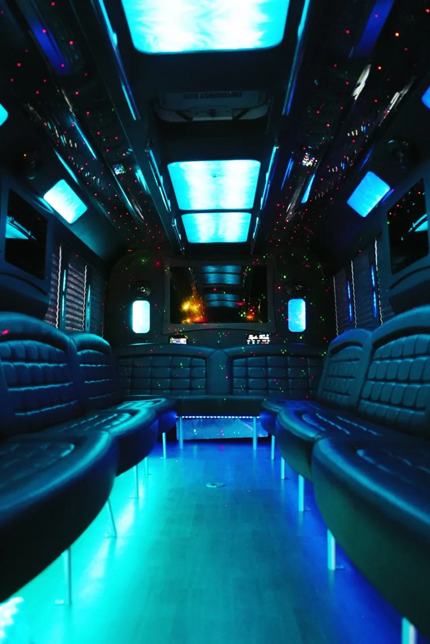 Party bus interior with starlight ceiling in blue